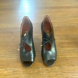 Bally’s Black Italian-Leather Heeled Bootie.